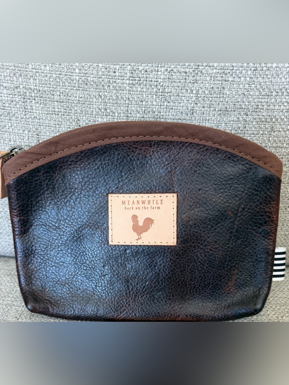 Meanwhile Back on the Farm Mocha Tuscan Leather cosmetic pouch.